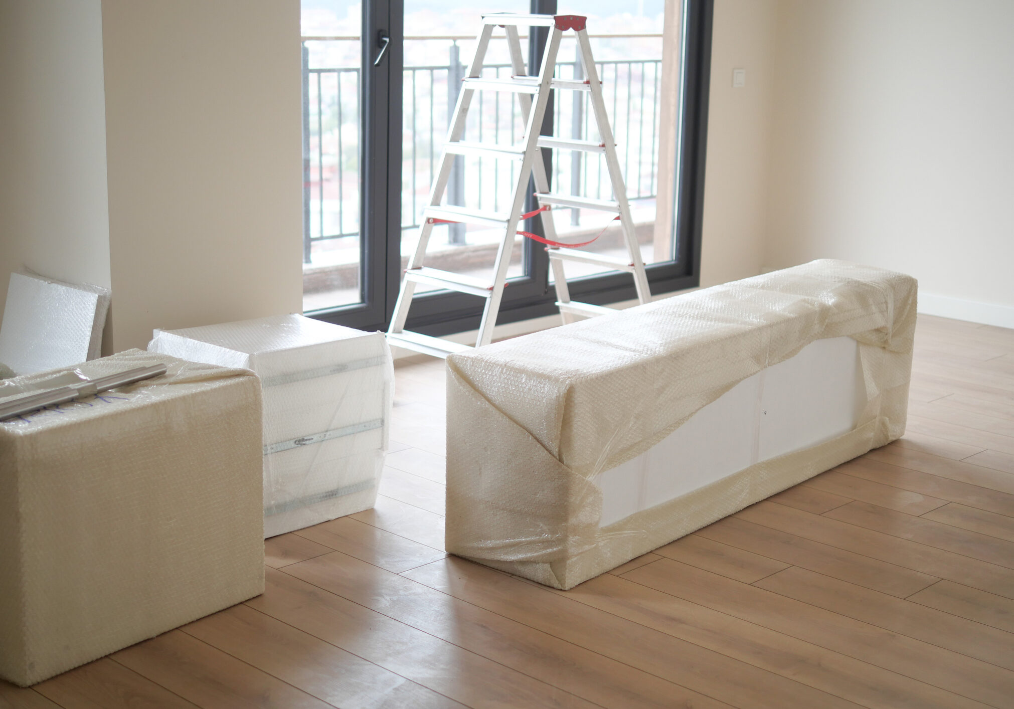 New Home With Furniture Still Wrapped and Ready for Setup,